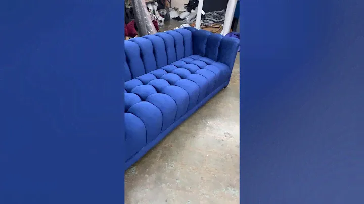 Blue velvet tufted sofas for sale.